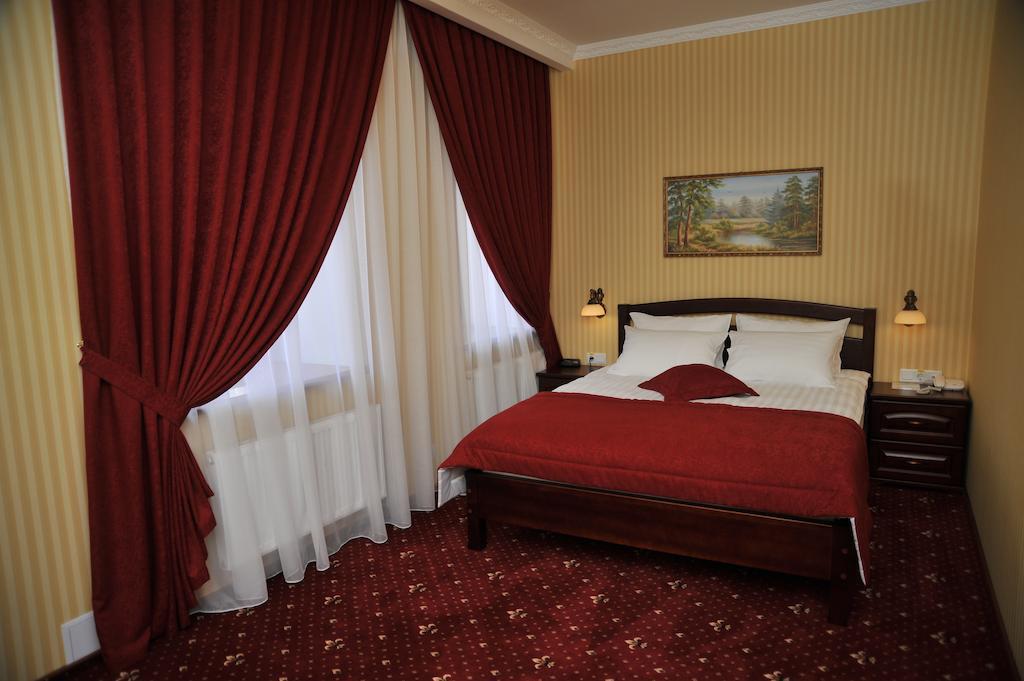 Slava Hotel Запорожье Номер фото