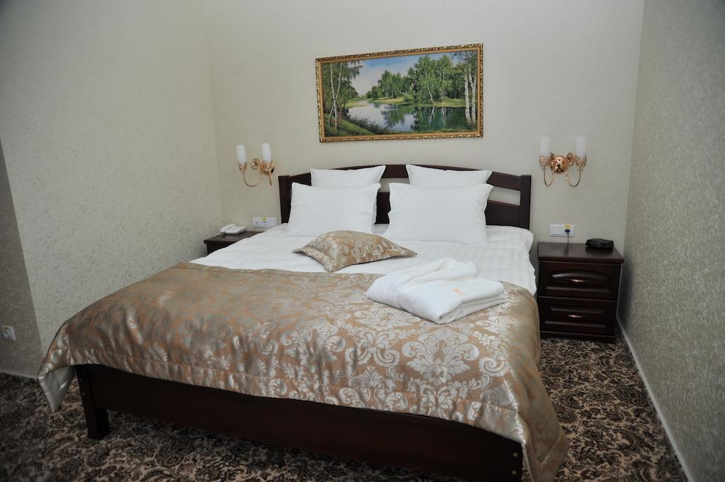 Slava Hotel Запорожье Номер фото